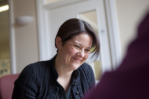 Woman smiling at a client
